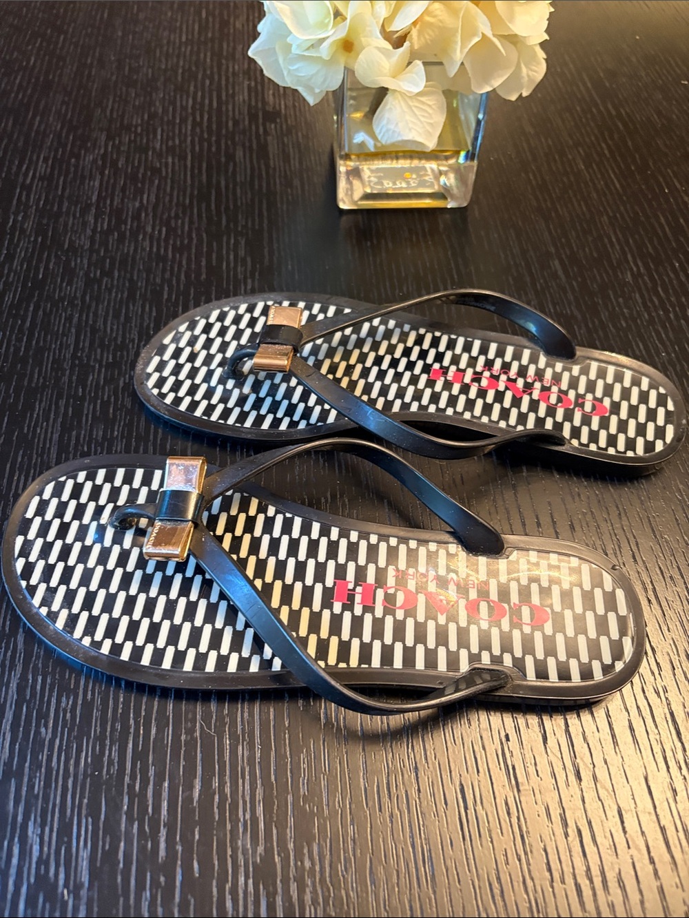 Coach Black Flip Flops with Gold Bow Detail - Picture 3 of 5